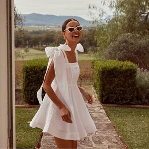 DISSH • NWOT Aisle Linen Bow Mini Dress